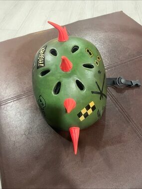 FUN Green BICYCLE Helmet with Red Spikes and Graphic Decals